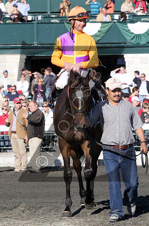 Moonwalk on the inside orange and purple silks, with Corey Lanerie up wins the 2012 JPMorgan Chase Jessamine for, 2012 Keeneland Fall Meet. Kitten'sPoint on the outside white and, came in 2nd.